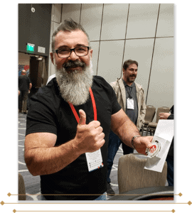 Man gives thumbs up after winner poker tournament.